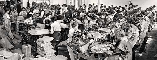 dozens of women at sewing machines